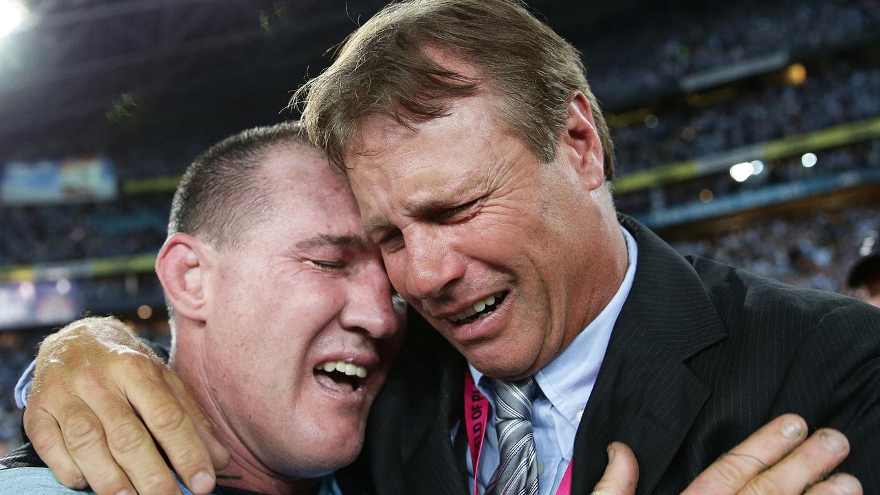 Shark's Paul Gallen and Andrew Ettingshausen celebrate the Sharks win of the 2016 NRL Grand Final between the Cronulla Sharks and Melbourne Storm at ANZ Stadium, Sydney. Picture: Brett Costello