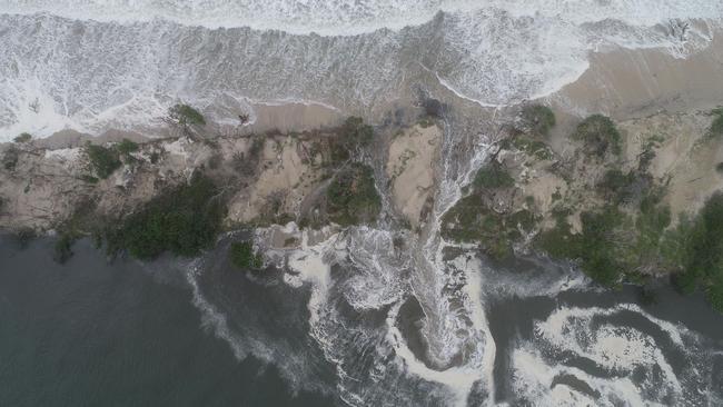 Aerial drone photography captures the huge seas breaking through the northern tip of Bribie Island. Picture: Zane Jones