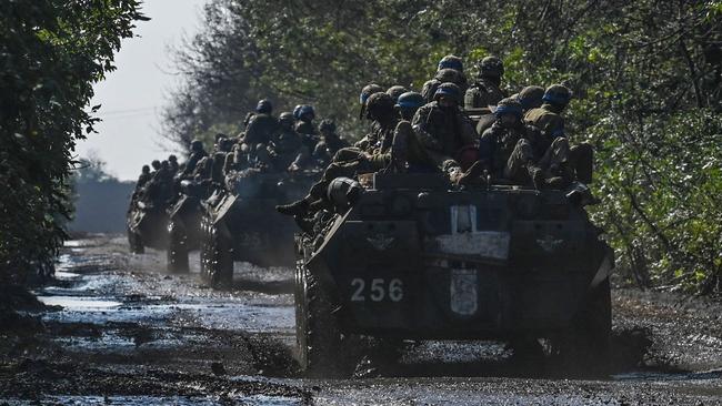 Ukrainian soldiers ride infantry fighting vehicles at Novoselivka in the eastern Donetsk at the weekend. Picture: AFP