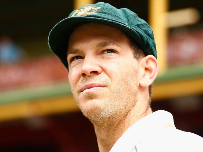 (FILES) In this file photo taken on January 3, 2020, Australia's wicketkeeper and captain Tim Paine looks on during the first day of the third cricket Test match between Australia and New Zealand at the Sydney Cricket Ground in Sydney. - Tim Paine has accused South Africa of blatant ball-tampering just days after Australian cricket was rocked by the sandpaper-gate scandal in 2018, alleging it was covered up by the match broadcaster. The former Australian skipper made the cheating claims in his new autobiography released on October 25, 2022 and widely reported by Australian media. (Photo by JEREMY NG / AFP) / -- IMAGE RESTRICTED TO EDITORIAL USE - STRICTLY NO COMMERCIAL USE --