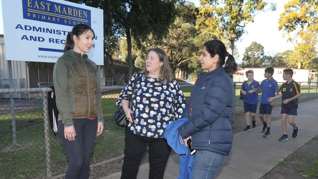 East Marden Primary parents Karen, Lisa, and Sarah outside the school. Picture Dean Martin