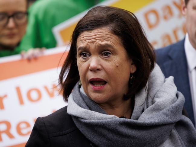 DUBLIN, IRELAND - NOVEMBER 28: Mary Lou McDonald (C) of Sinn Fein campaigns and talks to the media with the party's Director of Elections Matt Carthy (R) and Housing spokesperson Eoin O Broin (L) at Government Buildings before Friday's Irish general election on November 28, 2024 in Dublin, Ireland. The 2024 Irish general election to elect the 34th DÃÂ¡il will be held this Friday. 174 TeachtaÃÂ­ DÃÂ¡la (TDs) will be elected across 43 constituencies to the lower house of the Oireachtas, Ireland's legislature. In 2023, the number of TDs increased from 160 and constituencies from 39 to 43 making this the largest DÃÂ¡il in its history. (Photo by Dan Kitwood/Getty Images)