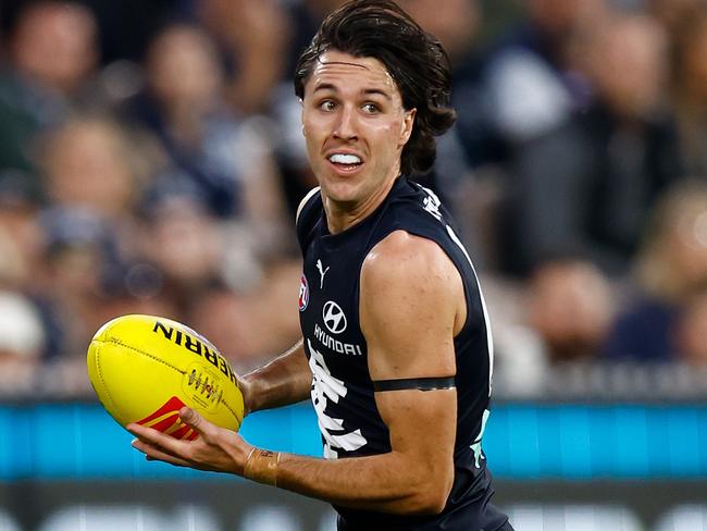 MELBOURNE, AUSTRALIA - MARCH 23: Oliver Hollands of the Blues in action during the 2023 AFL Round 02 match between the Carlton Blues and the Geelong Cats at the Melbourne Cricket Ground on March 23, 2023 in Melbourne, Australia. (Photo by Michael Willson/AFL Photos via Getty Images)