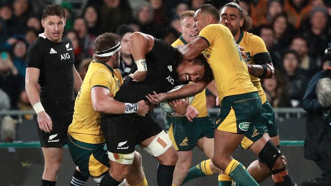 AUCKLAND, NEW ZEALAND - AUGUST 17: Ardie Savea of the All Blacks is tackled during The Rugby Championship and Bledisloe Cup Test match between the New Zealand All Blacks and the Australian Wallabies at Eden Park on August 17, 2019 in Auckland, New Zealand. (Photo by Hannah Peters/Getty Images)