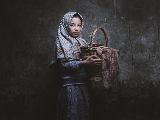 Image Name: Bread Carrier Photographer Name: Nather AlAsyf Year: 2018 Image Description: Kargily girl from Ladakh-Kashmir carrying bread for her family at early morning. Copyright: Nather AlAsyf, Saudi Arabia, Commended, Open Culture and Winner, Saudi Arabia National Award. Picture: Sony World Photography Awards/ Nather AlAsyf