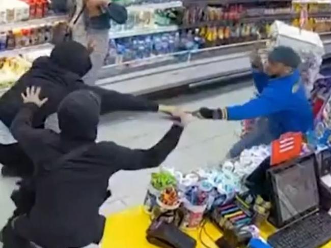 CCTV shows Melbourne convenience store worker Mohammed Panihani, 35, being attacked by teens armed with swords leaving him with lifelong injuries. Picture: 7 News