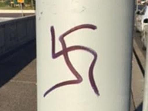 Offensive Swastika Gaffiti. Police are appealing for information following malicious damage in Sydney’s east.Yesterday (Tuesday 9 August 2016), police attended Campbell Parade, Bondi Beach following reports of malicious damage. Officers from Eastern Suburbs Local Command attended and located approximately 15 swastika symbols drawn in black permanent marker on the footpath, bus shelter, poles, benches and electrical boxes, as well as other graffiti. These symbols were obviously extremely offensive to the area's large Jewish community among others. Pic: NSW Police