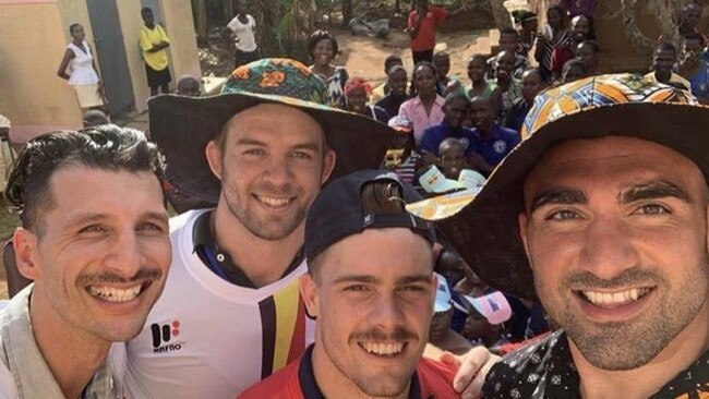 Christian Welch, Ryan Papenhuyzen and Tim Mannah in Uganda.