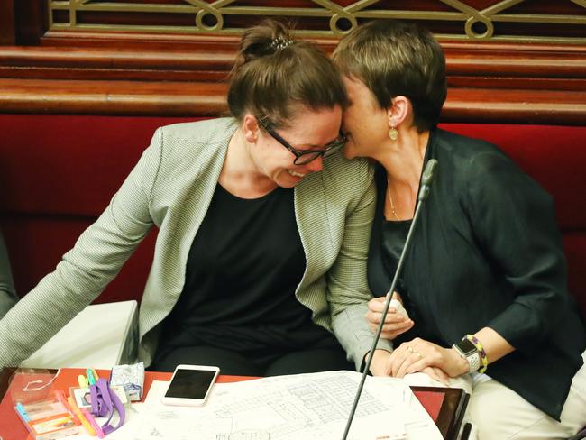 Victorian Labor MPs Jaclyn Symes and Jaala Pulford are seen after Voluntary Assisted Dying Bill 2017 passed. Picture: AAP Image/David Crosling