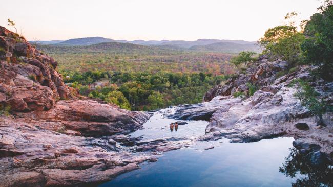 64/71Most beautiful places in the Northern Territory
Gunlom Falls, Kakadu National Park - Northern Territory
Being able to wash off the heat of the day by jumping in the Gunlom Plunge Pool is just a fraction of what makes a visit to this Kakadu waterfall so special. The rest is admiring the unending view of the park below from this iconic natural infinity pool. Picture: Tourism NT/Salty Wings