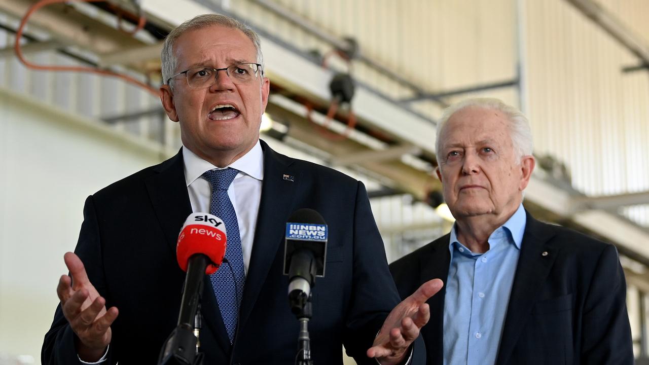 Prime Minister Scott Morrison and Federal Liberal candidate for Dobell Michael Feneley speak to the media during a visit to FMC Australia in Wyong, in the battle ground of Dobell earlier this month. Picture: AAP