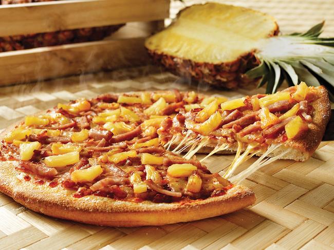 Domino's Hawi'ian pizza. The pizza chain sells more than 5 million ham and pineapple pizzas a year across Australia.Credit: Domino's