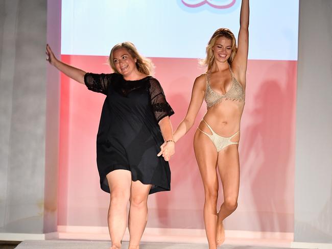 Sports Illsutrated Swimsuit editor MJ Day hits the runway in Miami alongside 2016 cover girl Hailey Clauson. Picture: Getty.