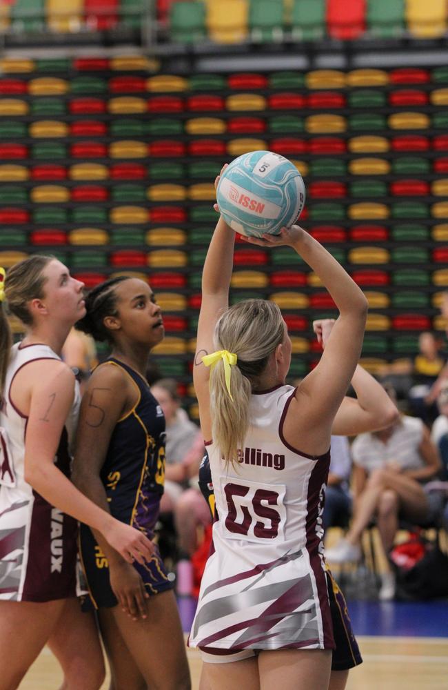 Netball action at QISSN 2024 held in Townsville. Clairvaux Mackillop College v St Joseph's College