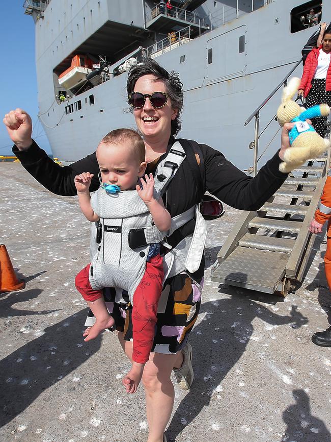 Evacuees from Mallacoota arrive on the navy ship HMAS Choules at the port of Hastings. Picture: Ian Currie