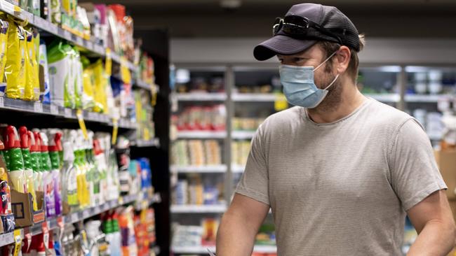 A shopper pictured wearing a mask at Woolworths Bondi on Monday. Picture: Monique Harmer