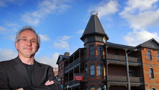 Burnie Mayor Steve Kons in front of his newly developed IKON Hotel at Burnie