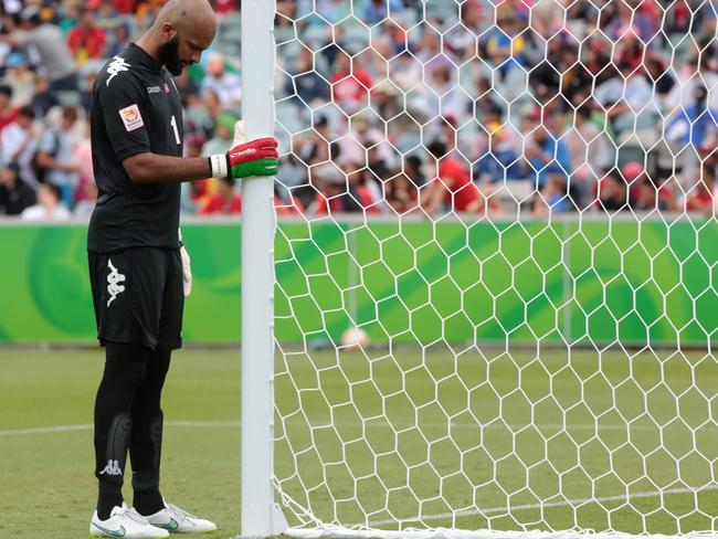 Oman's goalkeeper Ali Al Habsi waits for the play to start in the second half of their first round soccer match of the AFC Asia Cup against South Korea in Canberra, Australia, Saturday, January 10, 2015. (AP Photo/Andrew Taylor)