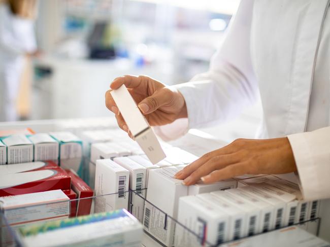 Close up of a pharmacist working