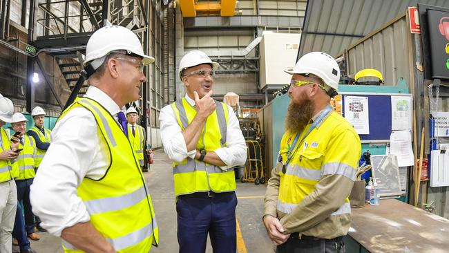 Deputy Prime Minister and Minister for Defence, Richard Marles with SA premier Peter Malinauskas, visiting the Osborne Naval Shipyard with worker Terry. Pic RoyVPhotography