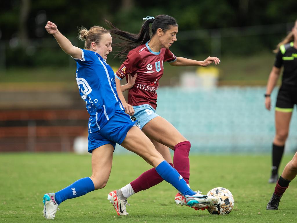 Olympic’s Priya Sciuriaga defending against Mona Walker. Picture: Julian Andrews