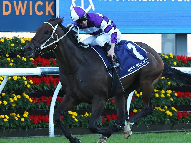 SYDNEY, AUSTRALIA - APRIL 06: James Mcdonald riding Riff Rocket  wins Race 9 ATC Australian Derby during Sydney Racing at Royal Randwick Racecourse on April 06, 2024 in Sydney, Australia. (Photo by Jeremy Ng/Getty Images)