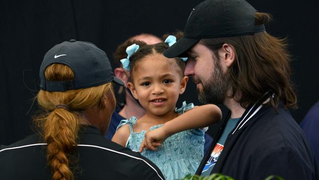 Serena Williams and her husband Alexis Ohanian talk to their daughter Alexis Olympia. Picture: AFP