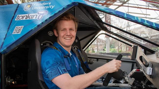 Bryn Jarvis at the wheel of their innovative solar-powered vehicle. Picture: Supplied