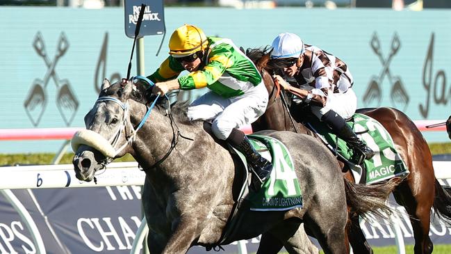 SYDNEY, AUSTRALIA - APRIL 06: Damian Lane riding Chain Of Lightning wins Race 7 James Squire T J Smith Stakes during Sydney Racing at Royal Randwick Racecourse on April 06, 2024 in Sydney, Australia. (Photo by Jeremy Ng/Getty Images)