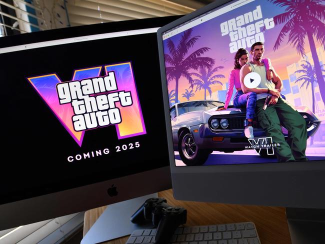 This illustration photo created in Los Angeles, California, on December 5, 2023, shows Rockstar Gamesâ Grand Theft Auto 6 trailer played on computer screens. The first trailer for 