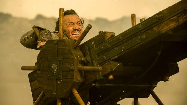 Bronn takes on Daenerys and Drogon with the catapult.