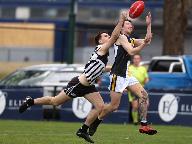 EFL: Chirnside Park’s Samuel King is spoiled by Riley Tempany of Surrey Park. Photo: Hamish Blair