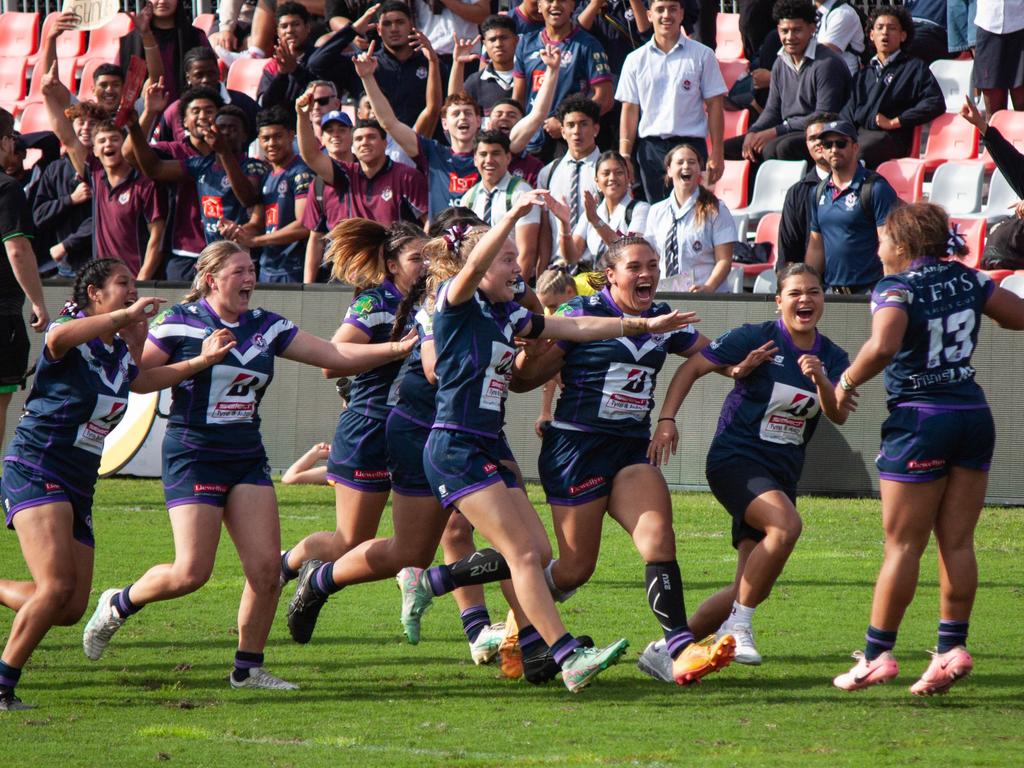 Ipswich State High celebrate after Shalom Sauaso scored the match-winning try in the southeast Queensland final. Picture: Milahn Situa