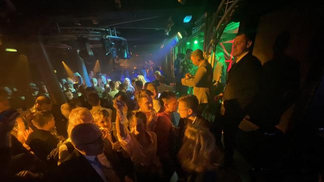 George Brandis (bottom left) at a nightclub.