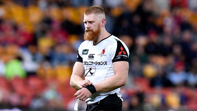 Ed Quirk walks off after his controversial red card against the Reds. Picture: Getty