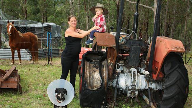 Nymboida bushfire recovery volunteer Georgia Foster Eyles with her daughter, Maisy, 2. Georgia helped residents in the aftermath of the blaze that destroyed more than 80 homes in the town on November 8 last year. Pictures: Toni Fuller