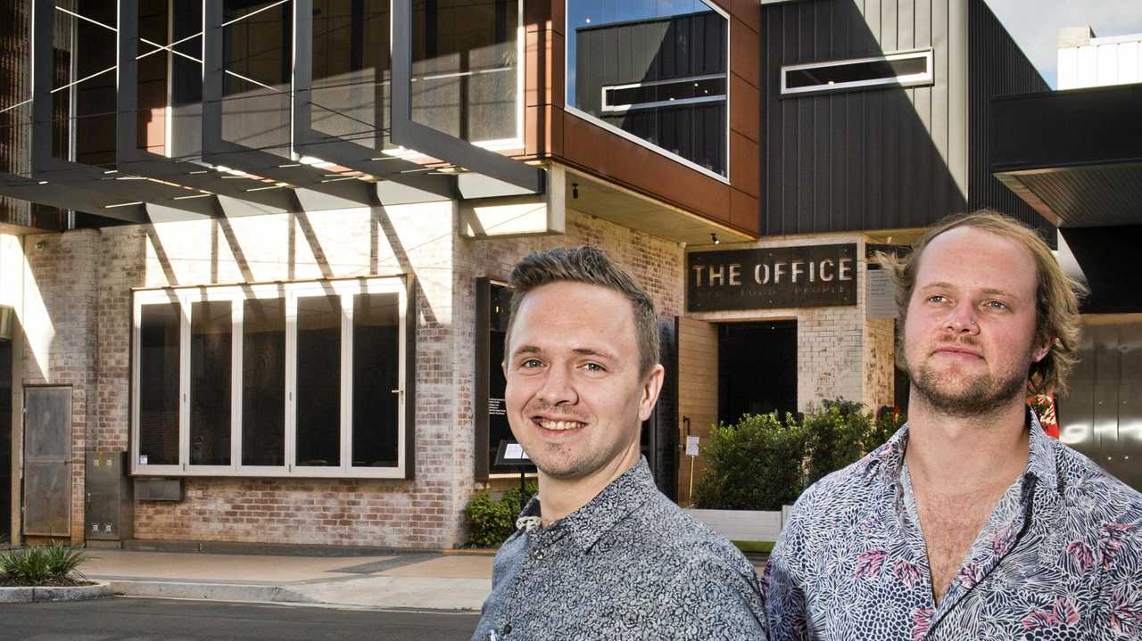 OFFICE HOURS: David Brosnan and Ollie Carpenter from The Office look forward to a new beginning at the Duggan St bar. Picture: Nev Madsen