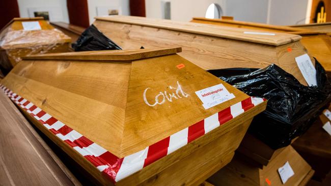 A coffin with a 'risk of infection' notice before cremation at the crematorium in Meissen, eastern Germany. Picture: AFP