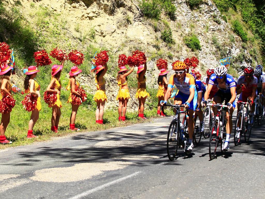 Pom Pom girls cheer on riders at the 2010 Tour de France.