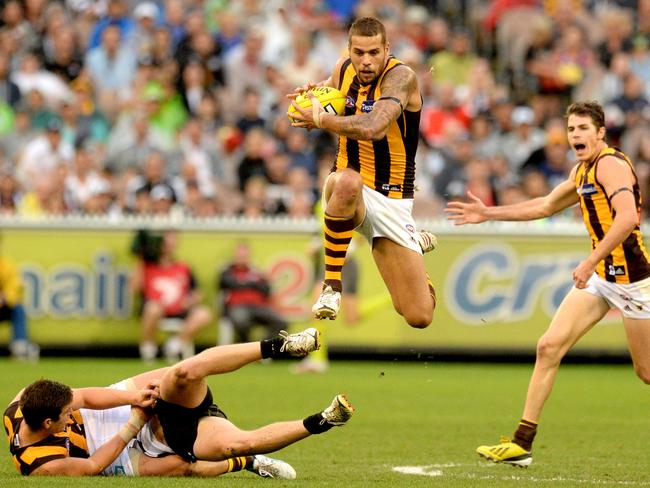 Lance Franklin leapfrogs fallen players on the way to a monster goal against Collingwood in 2013.