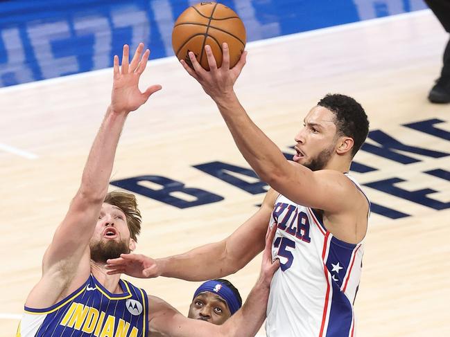 INDIANAPOLIS, INDIANA - JANUARY 31: Ben Simmons #25 of the Philadelphia 76ers shoots the ball against the Indiana Pacers at Bankers Life Fieldhouse on January 31, 2021 in Indianapolis, Indiana. NOTE TO USER: User expressly acknowledges and agrees that, by downloading and or using this photograph, User is consenting to the terms and conditions of the Getty Images License Agreement.   Andy Lyons/Getty Images/AFP == FOR NEWSPAPERS, INTERNET, TELCOS & TELEVISION USE ONLY ==