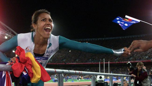 Cathy Freeman celebrates her win in the 400m in 2000. Carr’s state government was responsible for delivery the Olympics. Picture Craig Borrow.