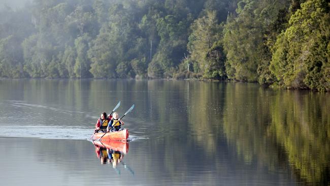 Kayaking on the river at Corinna Wilderness Experience.