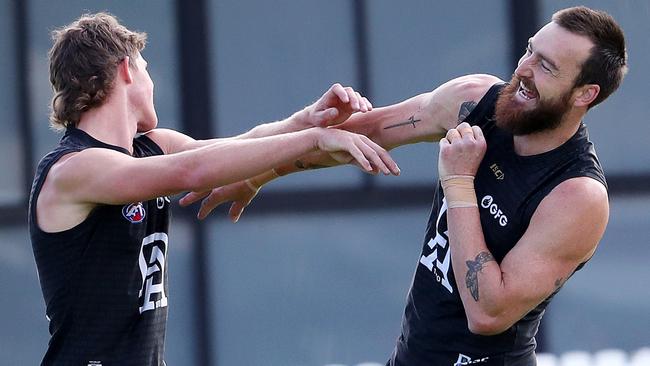 Port Adelaide's Mitch Georgiades has a laugh with Charlie Dixon Picture: Sarah Reed