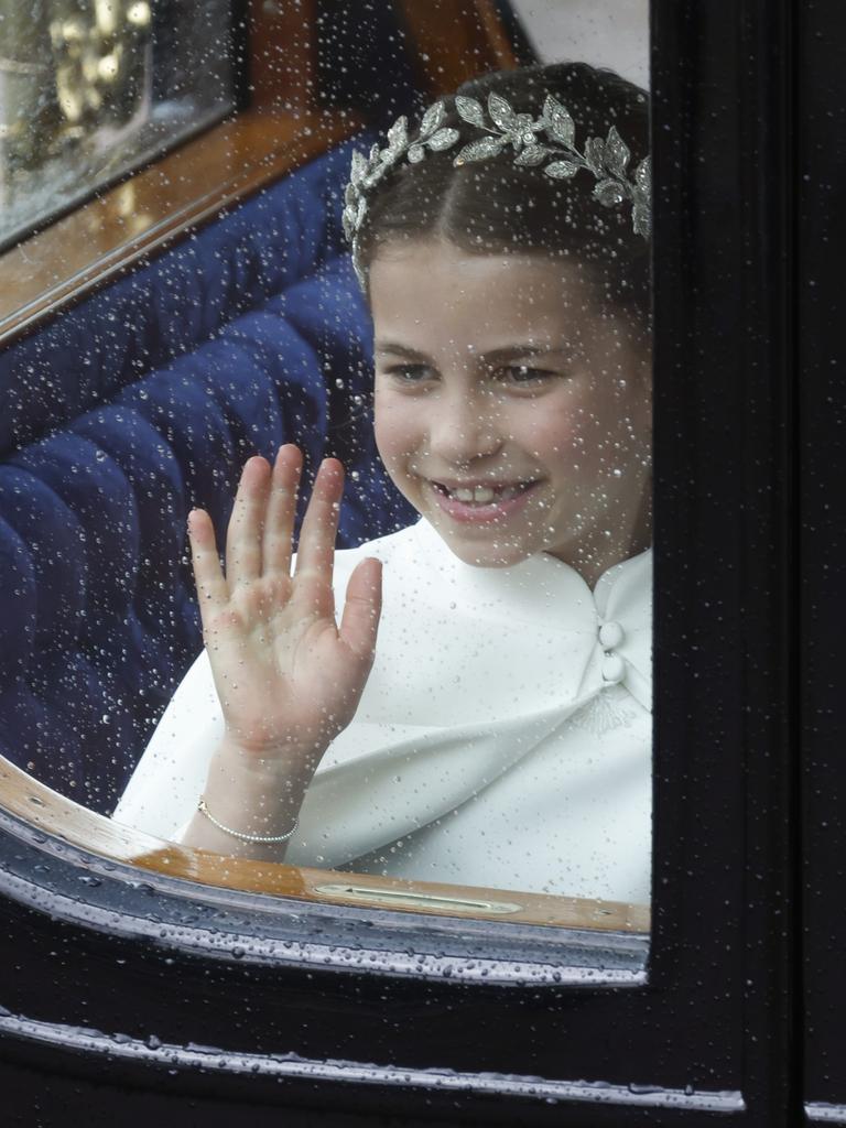 Princess Charlotte waves to the public. Picture: John Phillips/Getty Images