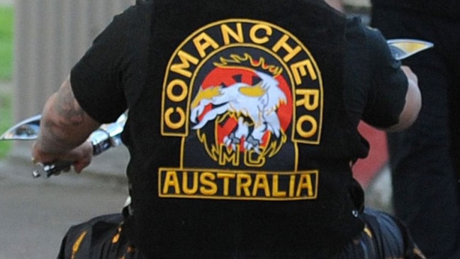 A man who police allege has ties with the Comancheros bikie gang has been arrested on weapon and drugs charges.