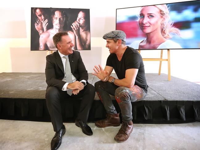 Accor Hotels Chief Operating Officer Pacific, Simon McGrath with artist Vincent Fantauzzo in front of some of his works for the Art Series Hotel. Picture: Lyndon Mechielsen/The Australian