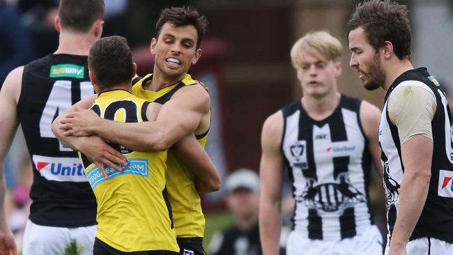 Sam Lloyd celebrates Richmond’s VFL victory.