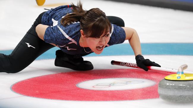 Japan's Chinami Yoshida shouts instructions during the curling competition. Picture: AP