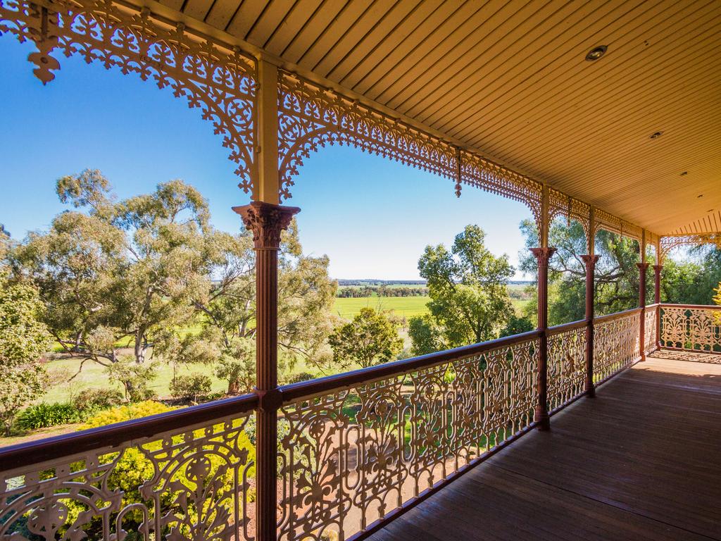 The house has been designed to suit the hot climate, with cement rendered brick walls, slate roof, verandas and balconies. Photo: Chloe Smith.